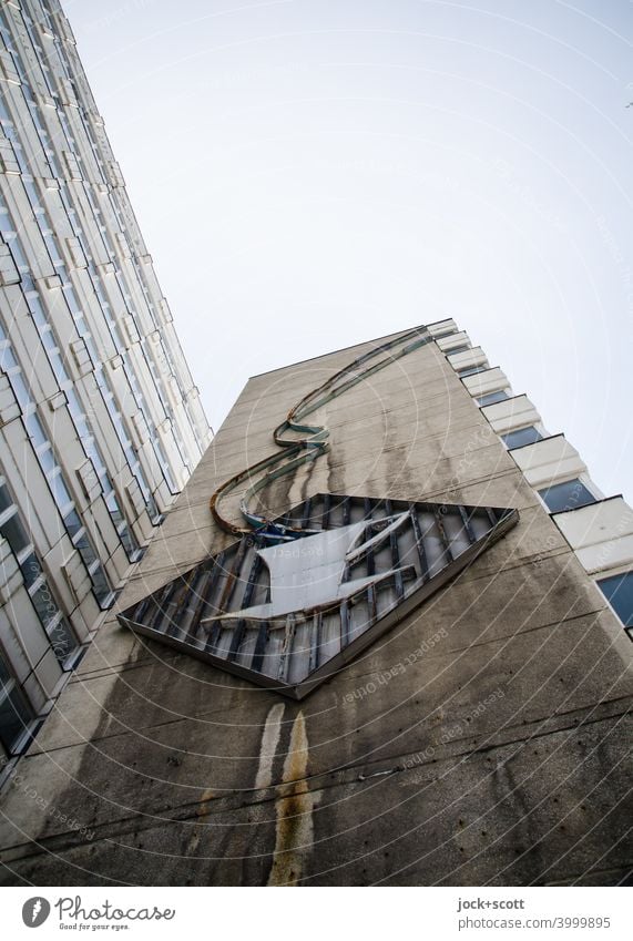 fragrant now cold coffee as a symbol on the facade Facade Post-war modernism GDR Nostalgia for former East Germany Retro Office building dreariness