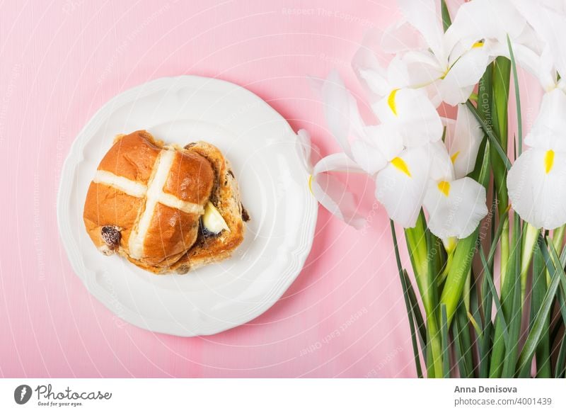 Easter Breakfast with Hot Cross Buns hot cross bun easter bread butter food traditional sweet flower iris fresh white holiday wooden celebration cake baked