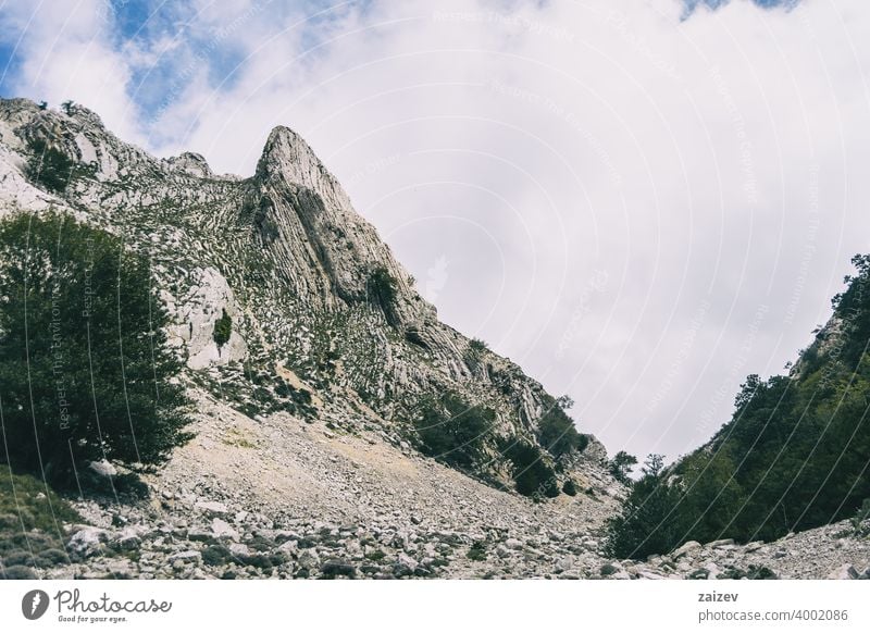 cloudy day in the mountains of the natural park of the ports, in tarragona (spain). eroded layered photography canyon nature outdoors travel destinations