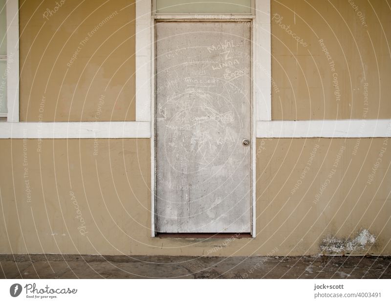 locked dirty door Dirty Wall (building) Style Closed Structures and shapes Thursday Island Australia Authentic Symmetry Simple Flaked off Lettering Weathered