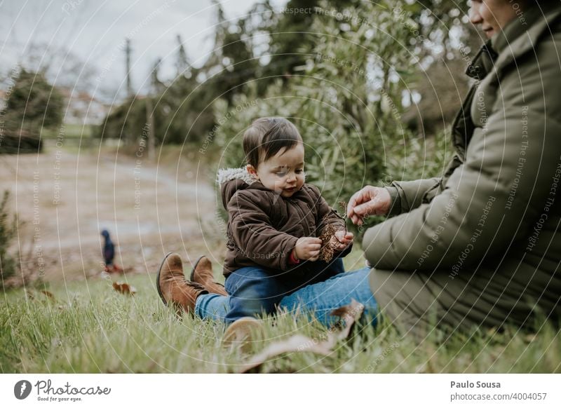 Mother and Son playing on the park motherhood Authentic Mother with child Together togetherness Infancy Happy Woman Child care Caucasian Happiness