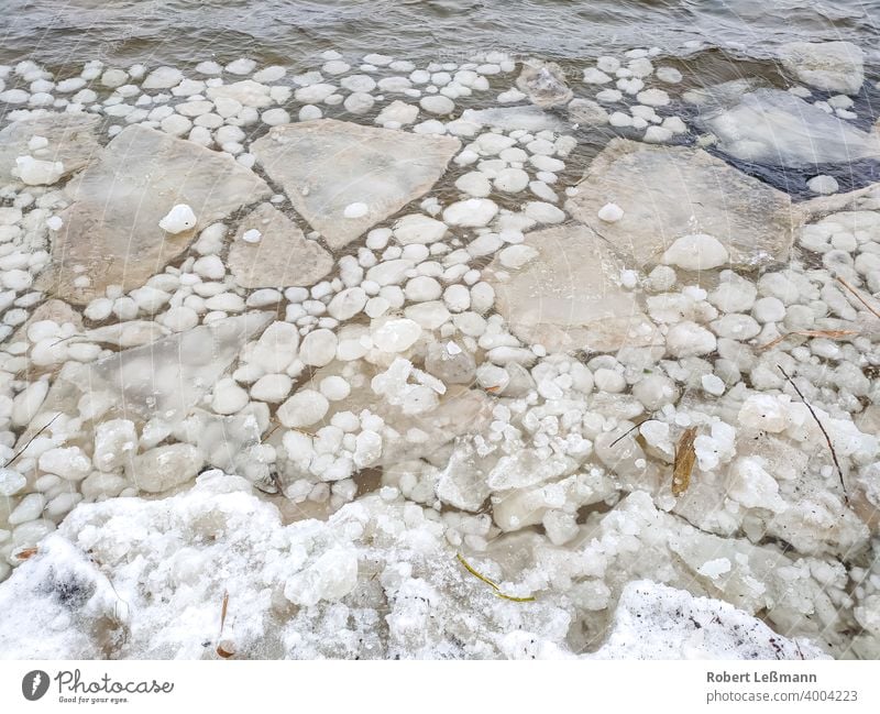 large and small ice floes on a lake Frozen Lake Ocean Frost Slice Ice Plaice quick-frozen ice crystals background icily Abstract Winter Snow Water Season