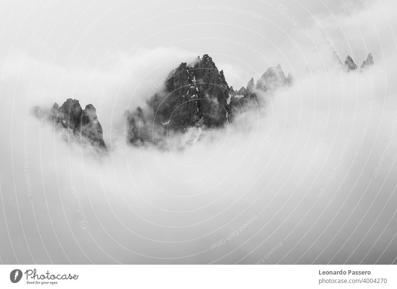 the mountains dolomites "rocca dei baranci" covered by clouds , San Candido - Italy Dolomites dolomiti dolomitic Mountain Mountain ridge italy Veneto alto adige