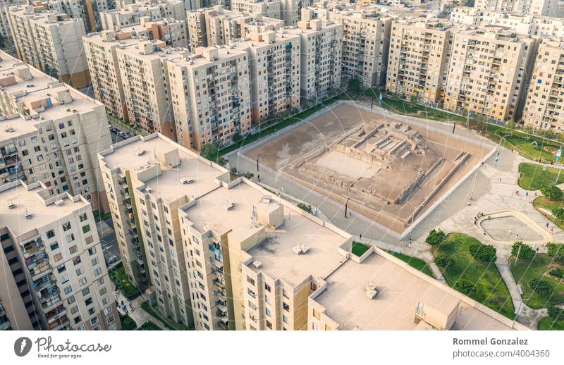 Lima, Peru - February 05, 2021: Aerial view of Huaca archeological site in San Miguel disctrict. Ancient pre-inca ruins in the middle of an urban city.