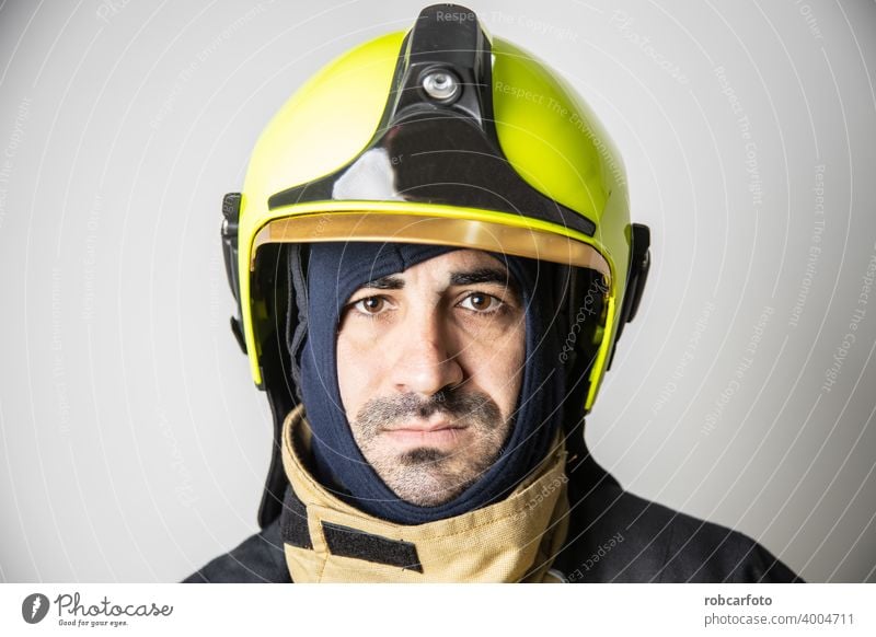 firefighter man on white background gear adult fireman service person portrait safety uniform protection yellow isolated caucasian occupation standing wearing