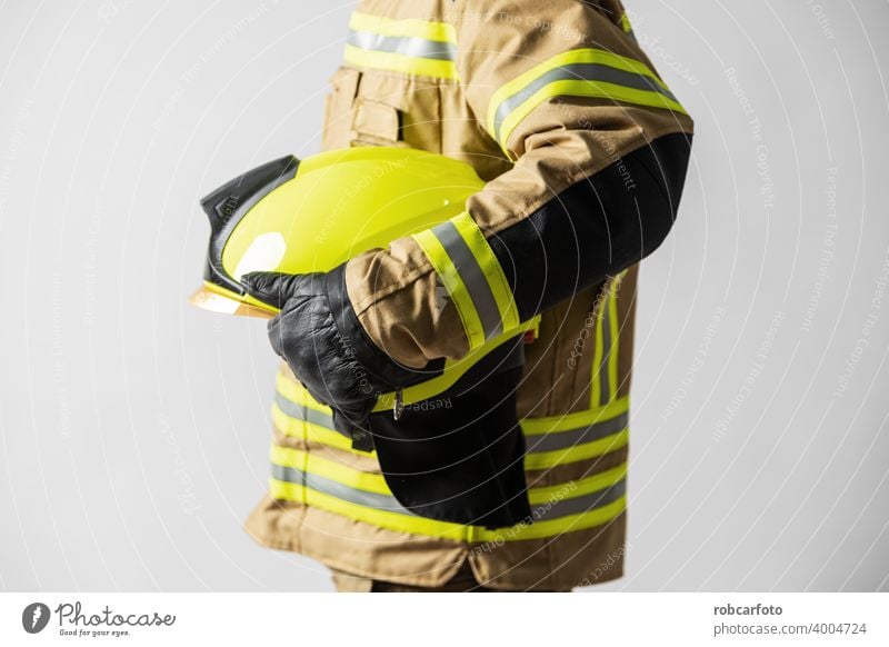 firefighter man on white background gear adult fireman service person portrait safety uniform protection yellow isolated caucasian occupation standing wearing