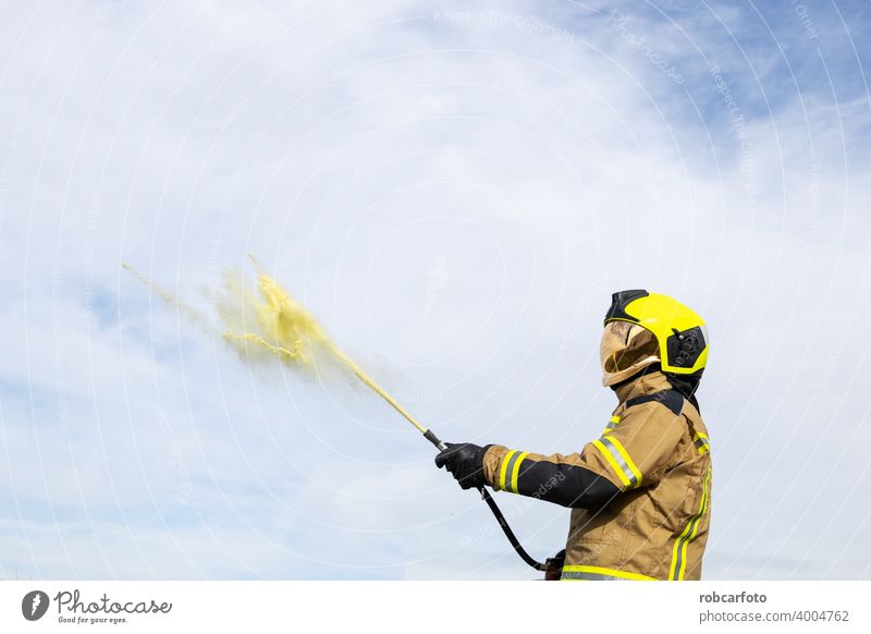 firefighter man on white background gear adult fireman service person portrait safety uniform protection yellow isolated caucasian occupation standing wearing