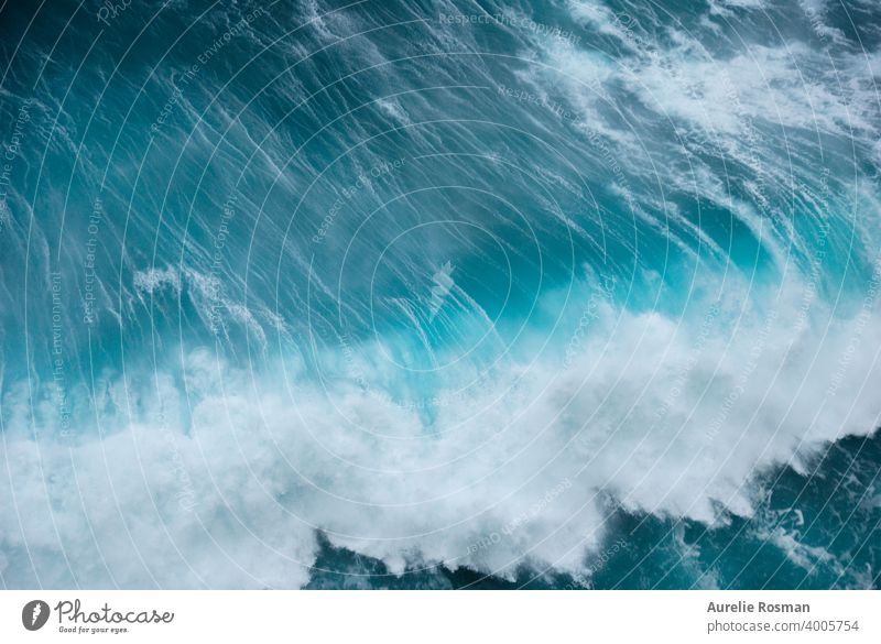 Blue wave slashing in the ocean. Madeira, Portugal Coast Landscape Porto Moniz Sea blue crash foam lines madeira island nature outdoor portugal power splash