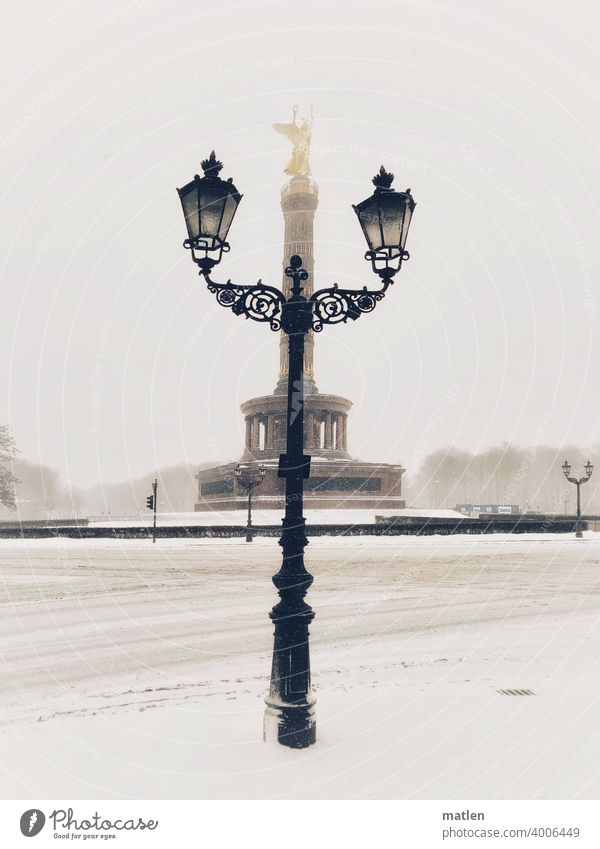 Winter golden lily Berlin Goldelse victory statue Victory column big star Capital city Landmark Transport Snow Snowfall Candelabra Sky Deserted Car-free