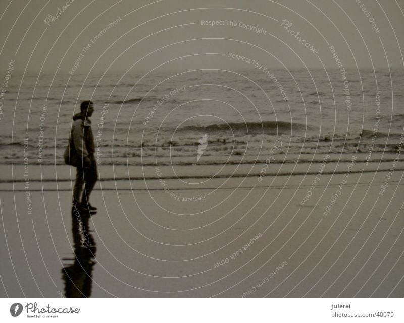 mudflat walker Ocean Man Waves Reflection Black & white photo old photo Water