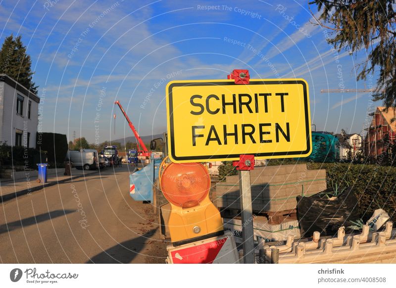 Construction site warning sign Warning sign Signage Transport car Bicycle Street Play street Build Flat (apartment) living space Luxury Poverty Credit peril