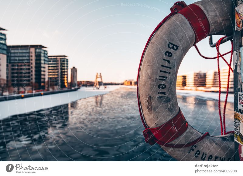 Elsen bridge with lifebelt in winter with Spree river Wall (barrier) Wall (building) Hip & trendy Light Day Copy Space middle Exterior shot Experimental