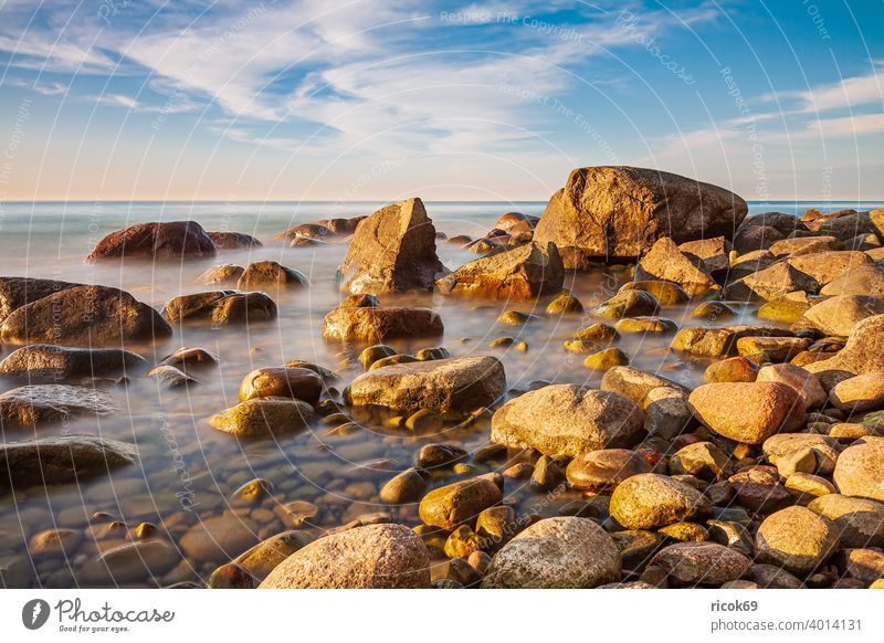 Stones at the Baltic Sea coast near Lohme on the island of Rügen stones Mecklenburg-Western Pomerania Sunset Baltic coast Rock Boulders Sky Blue Evening