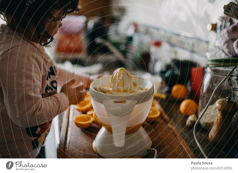 Child making orange juice at home Orange Orange juice Fresh childhood Preparation Vitamin Vitamin C Juicy Citrus fruits Healthy Eating Organic produce Close-up