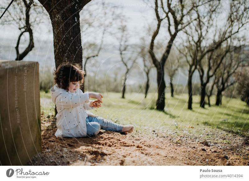 Cute girl playing with sand Child childhood Girl 1 - 3 years Infancy Toddler Human being Childhood memory Playing Lifestyle Caucasian Happy Children's game Day