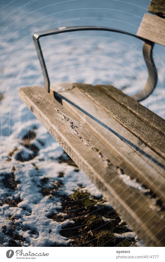 Bench in a park in the snow on a cold sunny winter day bench Winter Snow Deserted Park Nature Exterior shot Loneliness Colour photo Day White Calm