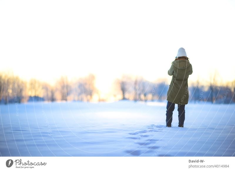 Woman taking a walk through the snow on a beautiful winter day in winter Winter To go for a walk Snow Winter magic Sunrise Christmas Winter's day Nature White