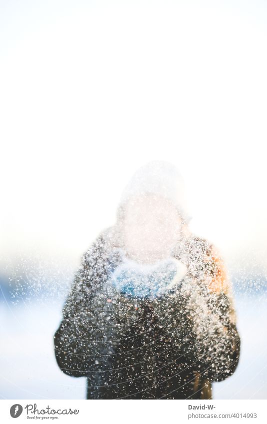 Woman blowing snow from her hands Winter Joy muck about onset of winter Snow snowed Snowfall Girl Cold Weather