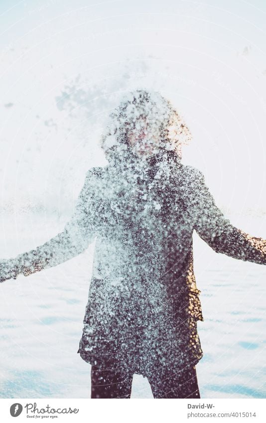 Man in winter behind a cloud of snow - it is snowing Snow Winter Snowfall snow cloud White Cold snow flurries onset of winter Winter's day Throw in the air