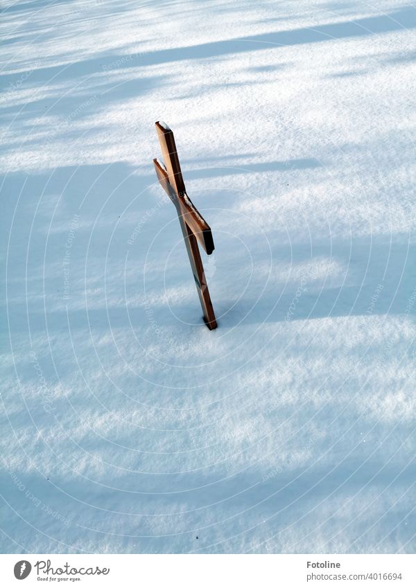 Snowed grave in a cemetery. Only recognizable by the wooden cross. Cemetery Winter Snow layer snowy Cold White Winter mood Winter's day Exterior shot Frost