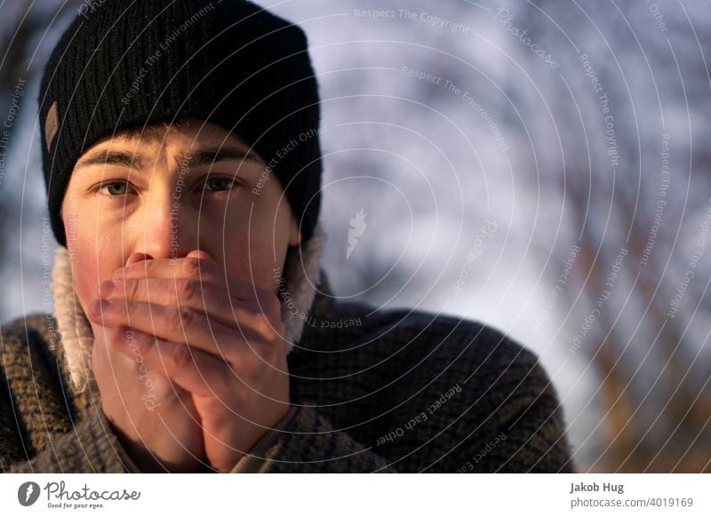 Cold hands in spring Winter Spring cold hands cold temperature Human being portrait Evening sun Forest walk hike Hiking To go for a walk Germany oberkochen