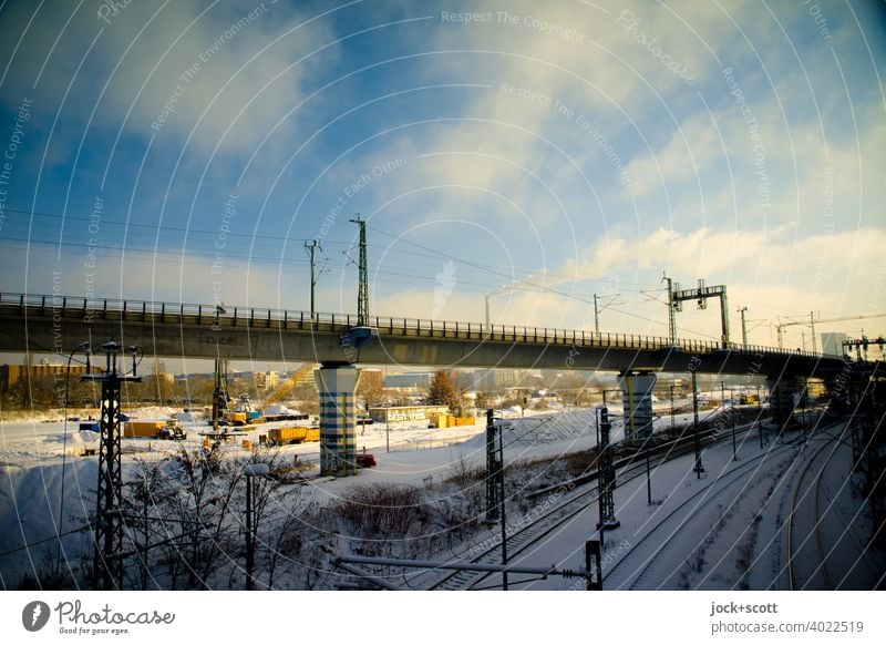 S-Bahn bridge under construction Construction site Architecture rail Winter Sky Clouds Sunlight Bridge Manmade structures Traffic infrastructure Snow