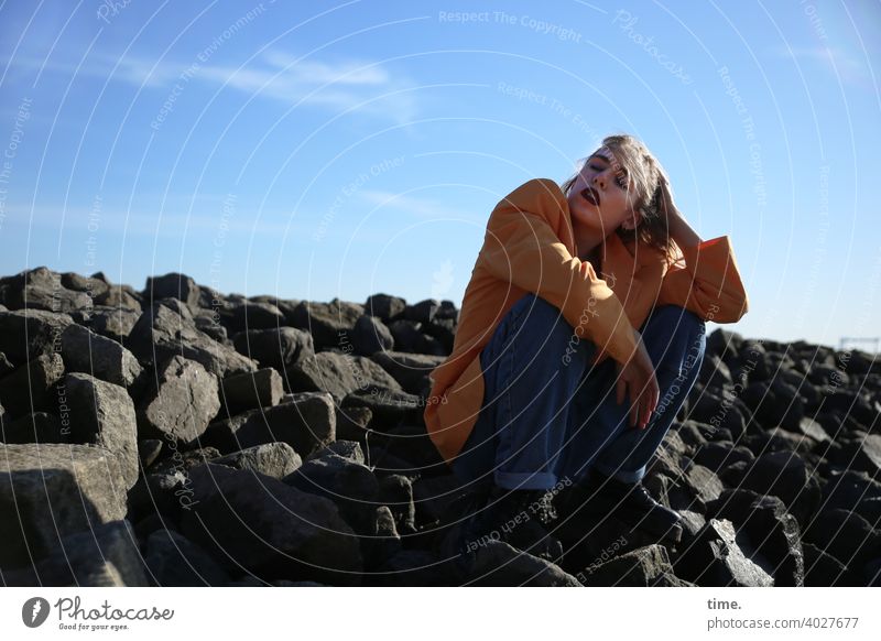 Lara Woman Jacket breakwater stones Sky Sit Hand Protection sunny jeans Rest on Support Clouds Shadow