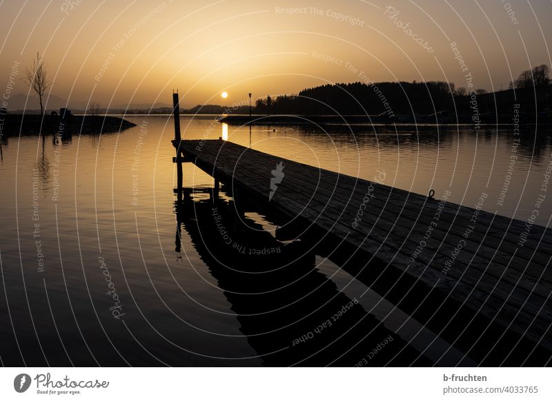 small wooden jetty in the evening sun Sunset Evening evening mood Sky Exterior shot Dusk Twilight Nature Landscape Deserted Calm Silhouette Horizon Moody Idyll