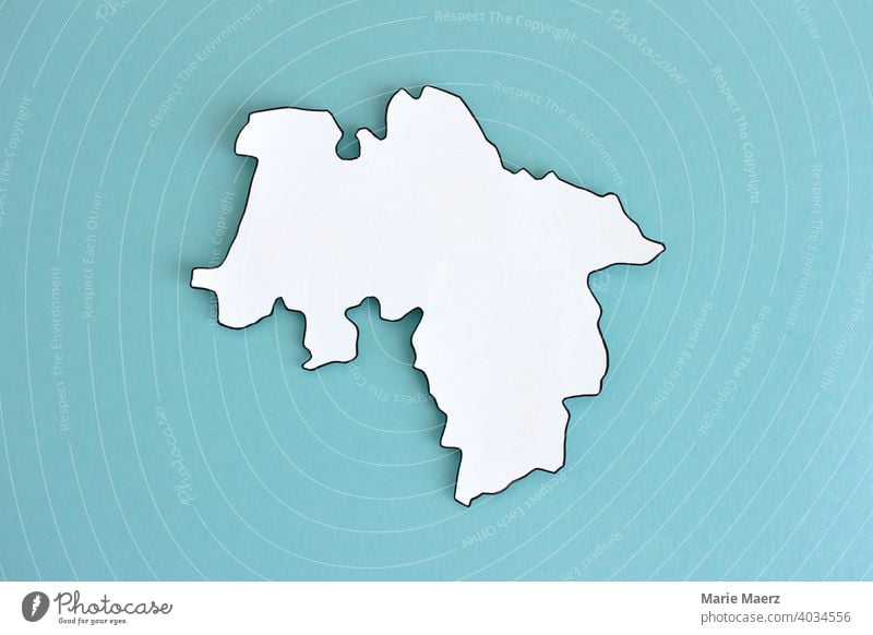 Federal state Lower Saxony as paper silhouette Illustration map Abstract frontiers Germany country Neutral Background Minimalistic Design Structures and shapes