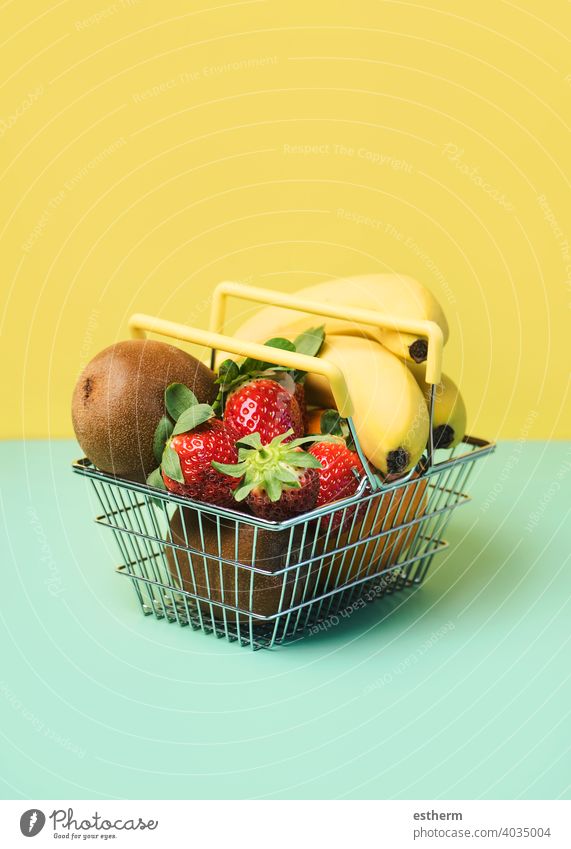 Shopping basket with fresh fruits shopping basket strawberries oranges bananas kiwis nutritional object freshness copy space ingredients diabetes farm summer