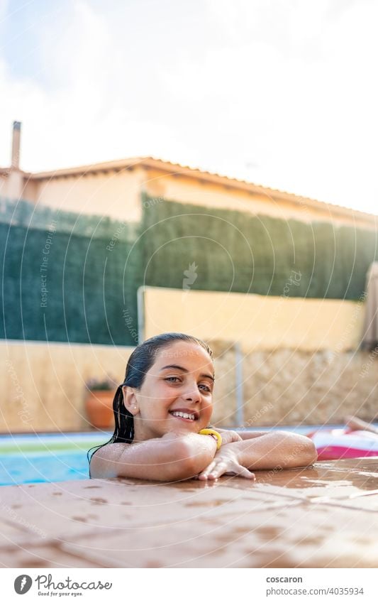 Funny kid smiling on a pool side 6 years old active african american background beach black blue boy brothers child children copy space copyspace daughter