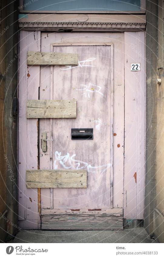 Boards for the World | Lockdown door lost places Broken board nailed Old building renovation case Wood 22 House number Mailbox Entrance locked tight graffiti