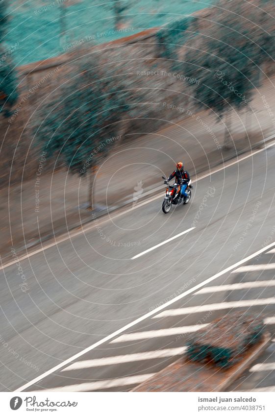 Motorcyclist on the road in the city Motor vehicle Motorcycle Motorcycling Man Drive swift Speed Street street photography Lifestyle Delivery Delivered