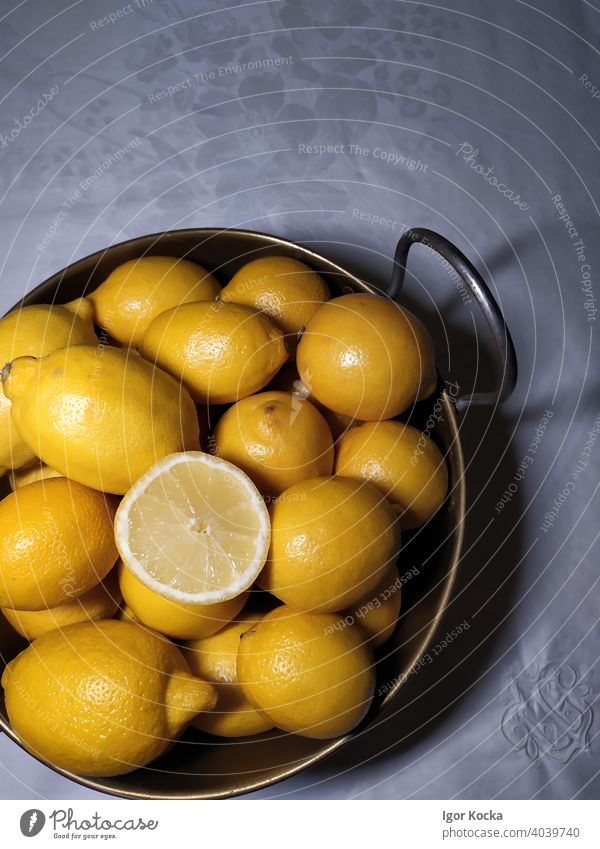 High Angle View Of Citrus Fruits In Bowl On Table Lemons yellow Fresh Citrus fruits Healthy Vitamin C Nutrition Food Organic produce top down Group of objects