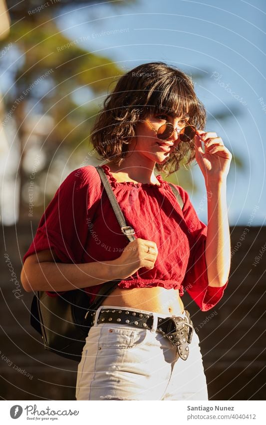 Portrait of teenager girl looking in the distance. madrid young lifestyle beautiful fun happy leisure woman smiling cheerful female youth city pretty outdoors