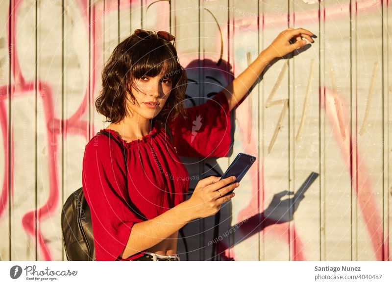 Portrait of teenager girl looking at the camera. madrid young lifestyle beautiful fun happy leisure woman smiling cheerful female youth city pretty outdoors