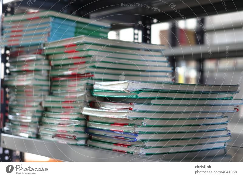 Books stacked on shelf books Shelves Reading School Lessons Education Study Academic studies Library Wisdom Elementary school High School Secondary school