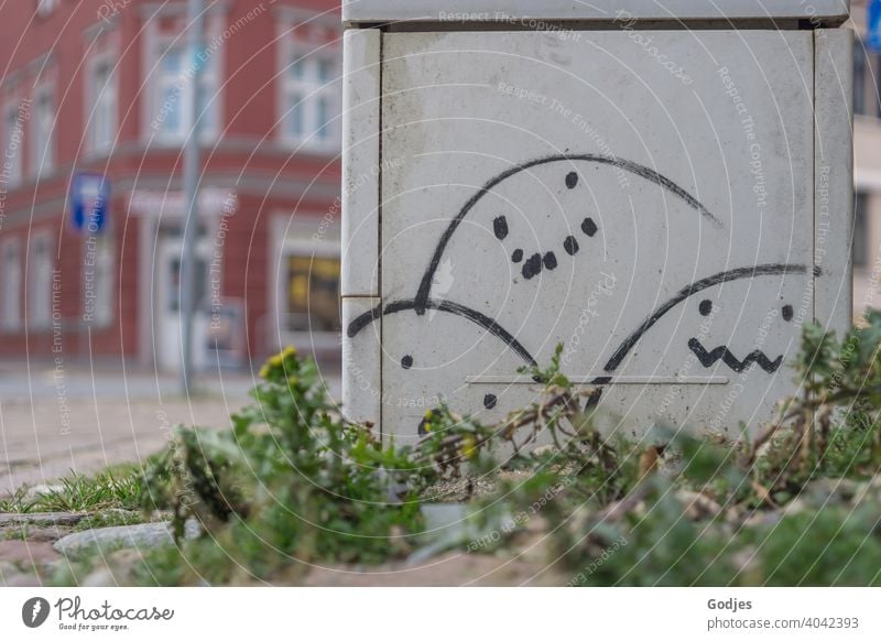 Electricity box with egg-shaped smileys at a street intersection, Graffiti eggs Easter power box public Daub Easter egg Egg Feasts & Celebrations Decoration