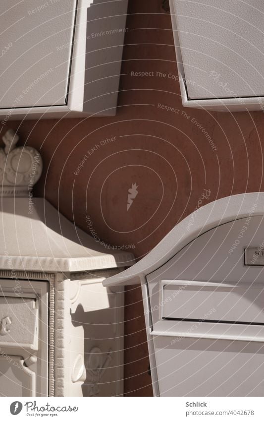 Information exchange, four mailboxes with text free space Close-up Partially visible Copy Space middle White high contrast Sidelight Streak of light Mail