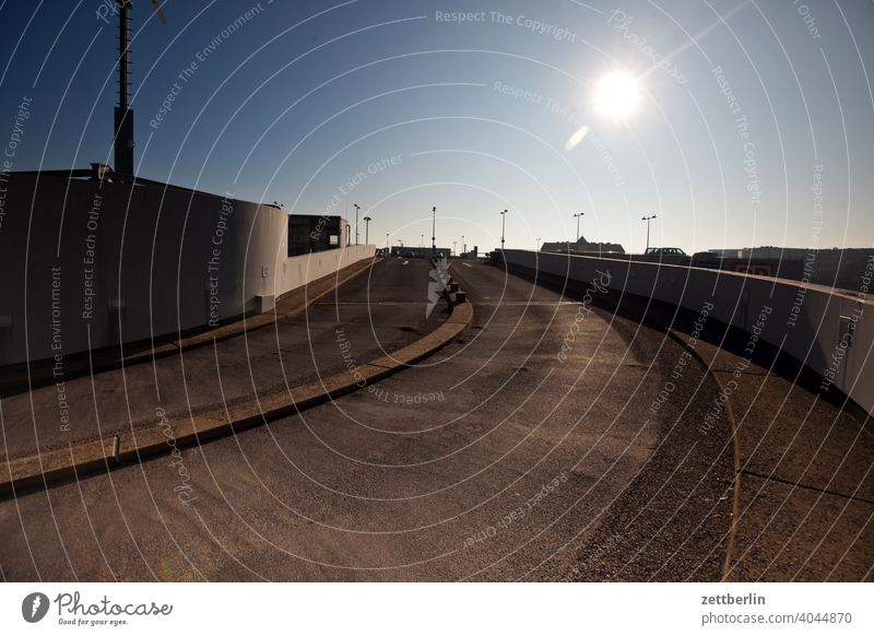 Car park access on the outside Building Sky Sky blue Deserted Copy Space housing Parking garage drive access road trace parking garage access Curve Parking lot