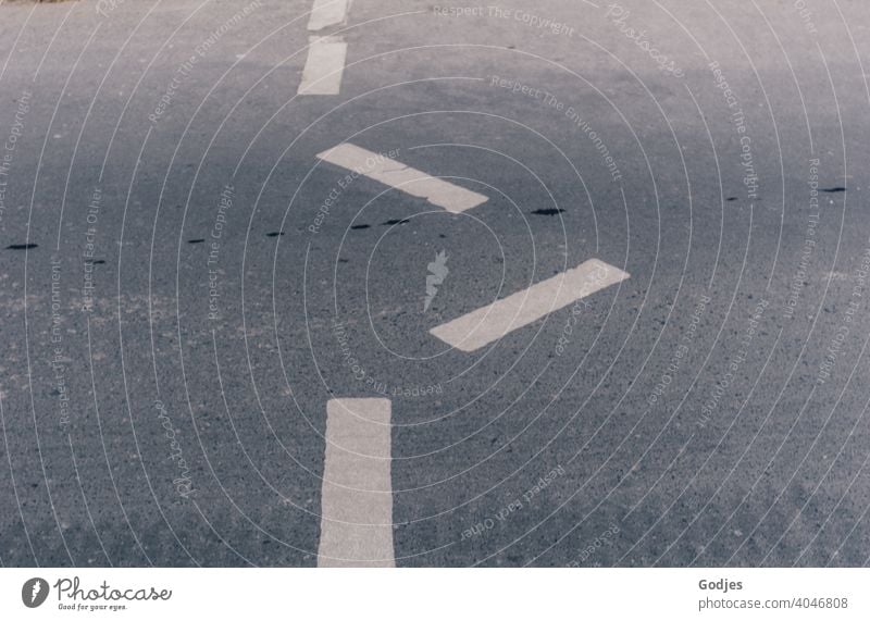 Error in lane marking ... straight across the road is out. Street painting lead away Pedestrian crossing Lanes & trails Deserted Exterior shot Light Asphalt