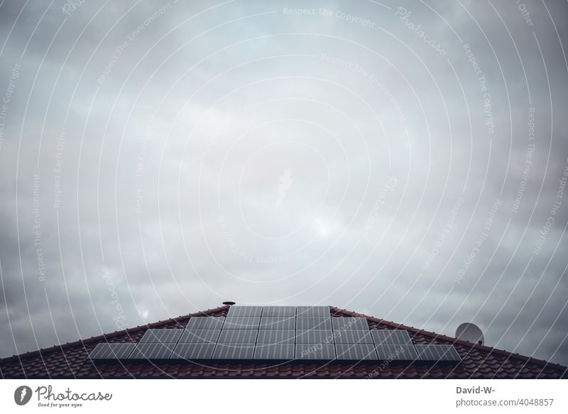 Photovoltaics in bad weather photovoltaics Bad weather somber unlucky Energy crisis Energy generation Roof House (Residential Structure) Solar Energy