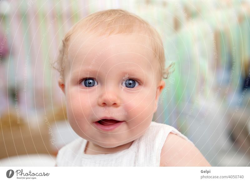 Beautiful blond baby smiling kid child young little adorable healthy happy infant funny white toddler boy caucasian cute beautiful childhood newborn small life