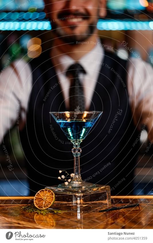 Barman is making cocktail at night club. bartender nightclub pub beverage liquor barman alcohol drink party restaurant professional nightlife preparation shaker