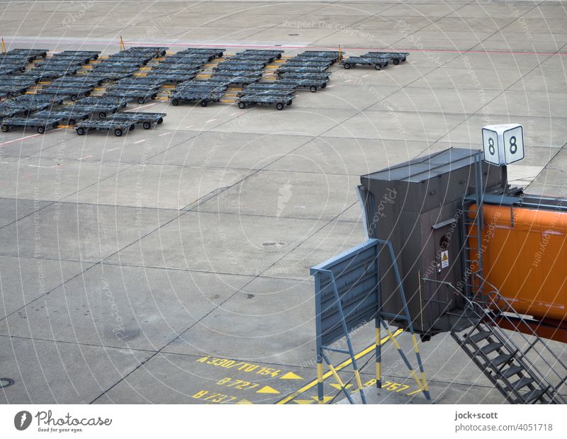 Container dollies at gate 8 boarding bridge Airport Ground markings Authentic Line Concrete slab number range Gate TXL Gangway Airfield bay Airport Berlin-Tegel