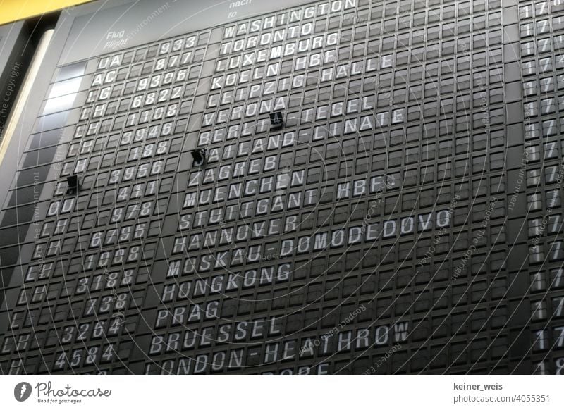 Scoreboard in the airport with flights all over the world - a classic Flights Airport technique Flight plan flight number Washington Toronto Luxemburg Moscow