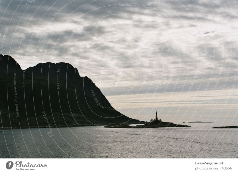 Leuchtum in Northern Norway Lofotes Lighthouse Coast Ocean Clouds Might Water north norway hurtigruten Watercraft Mountain Island North Sea Weather Gigantic