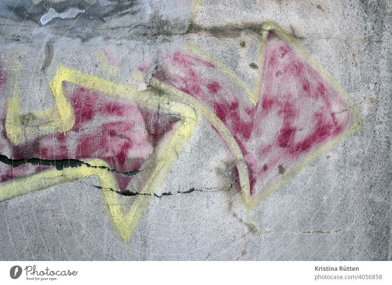 faded graffiti arrow Wall (building) Wall (barrier) Graffiti Arrow street art Sprayed Art detail Direction Colour background contour Pattern cracks Abstract