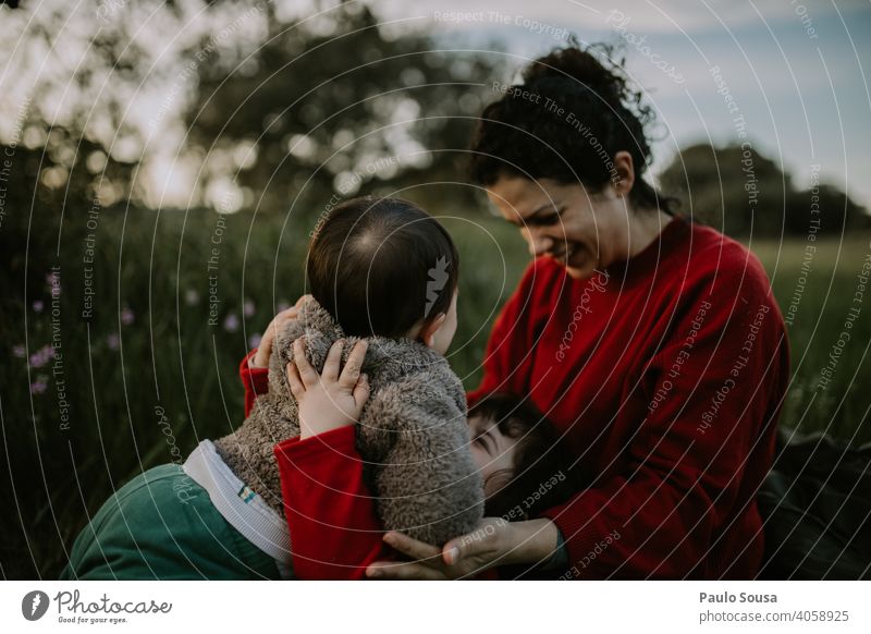 Mother with two childrens outdoors motherhood Mother's Day Mother with child Family & Relations family Caucasian 1 - 3 years 25-29 Years 30 - 45 years Infancy