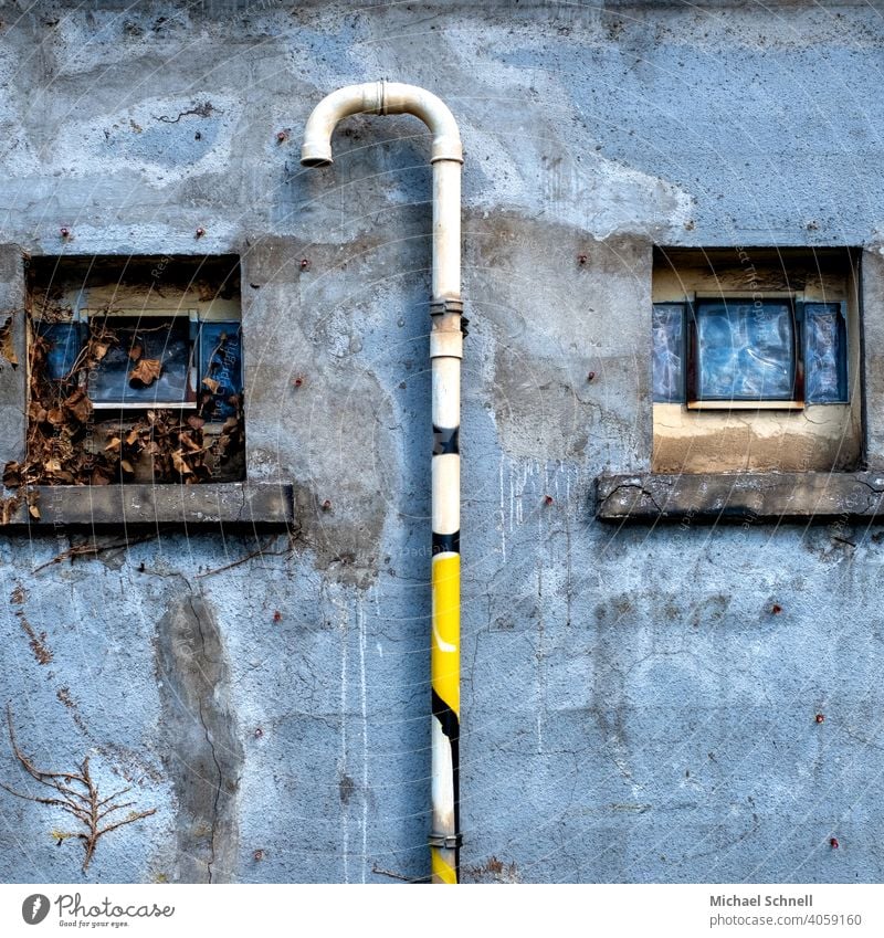 Two small windows and a pipe house wall Facade Wall (building) Exterior shot Deserted Wall (barrier) Building Gloomy Old House (Residential Structure)